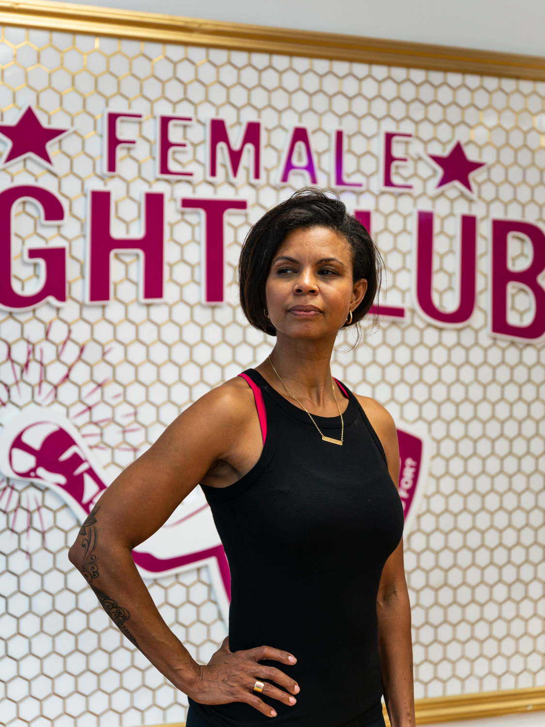 Joanna Edmondson stands in front of the sign for her new Female Fight Club studio space at 5919 Riverdale Ave. Edmondson started the club last year in Van Cortlandt Park during the early months of the coronavirus pandemic because she felt women needed a platform and a place to exercise when there was an absence of group fitness classes.