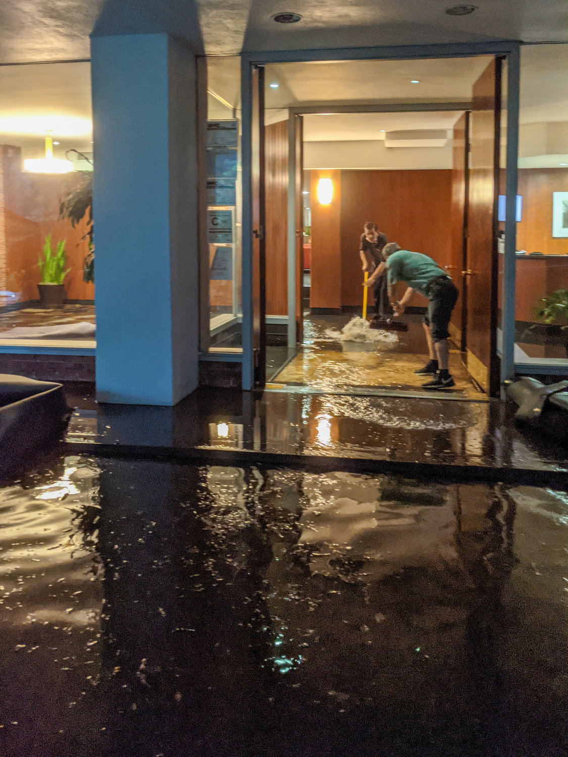 The lobby of 2727 Palisade Ave., was among several parts of the Spuyten Duyvil neighborhood that was flooded from remnants of Hurricane Ida. Neighbors blame sidewalk construction that was completed two years ago for the mess.