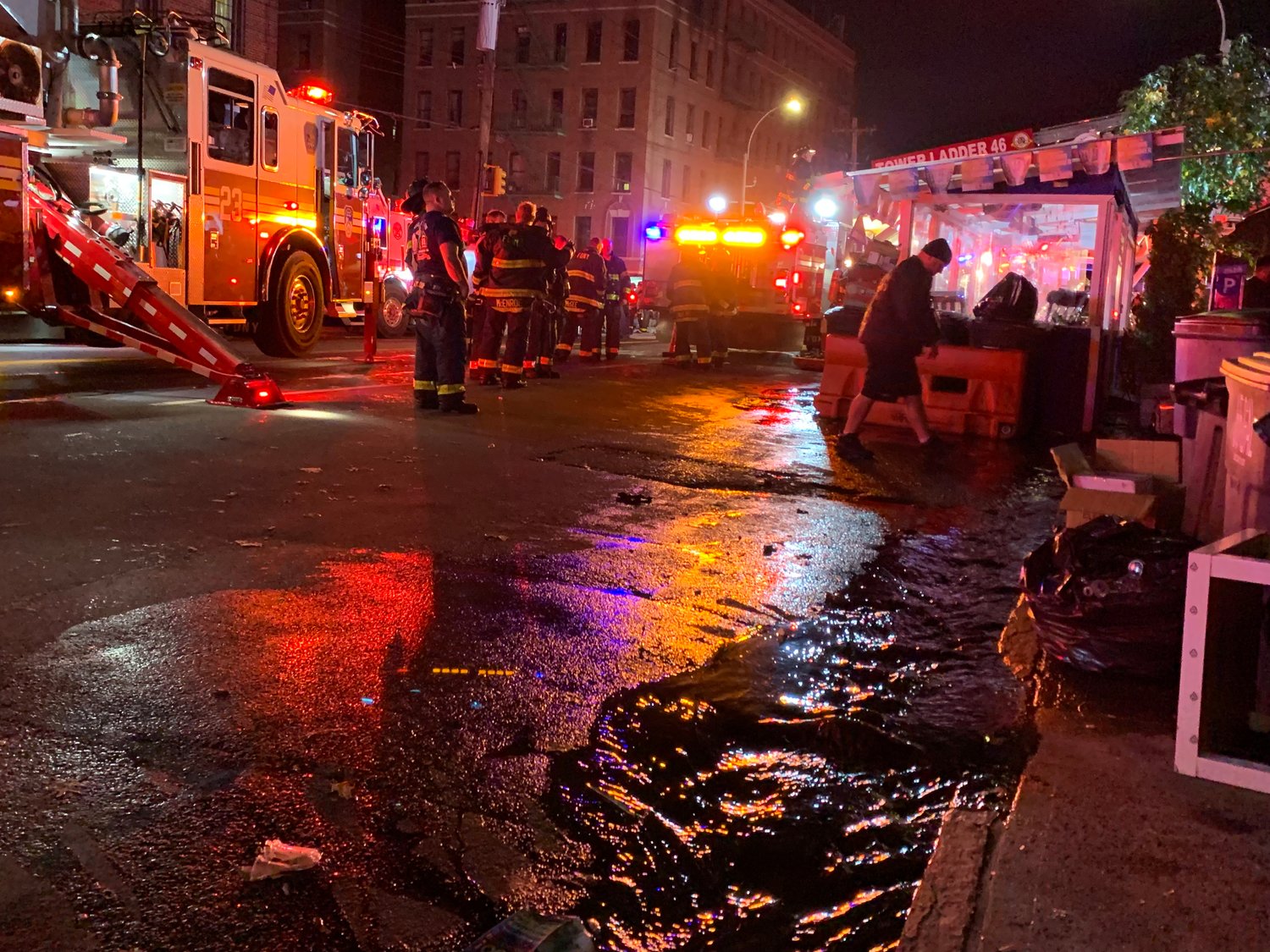 A river of water flows down Bailey Avenue as firefighters fight a four-alarm blaze late Monday night at Bailey Avenue and West 238th Street. It all happened near 181 W. 238th, where a fire destroyed a number of apartments in late September.