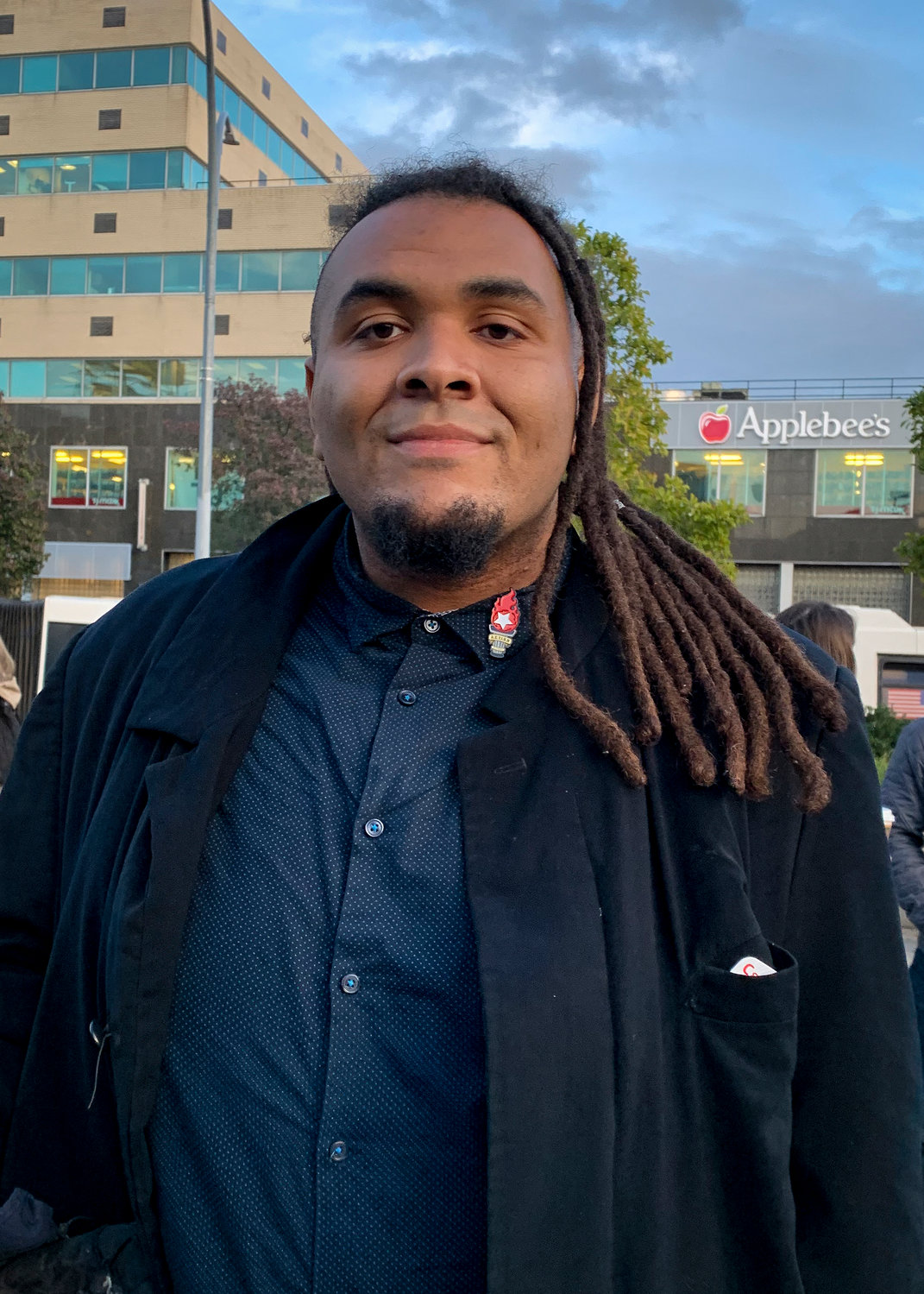 Victor Davila — who leads The Point Community Development Corp. — rallied with several local organizations for climate justice last week in Fordham Plaza. Davila and other advocates pushed for passage of the Climate and Community Investment Act early next year.