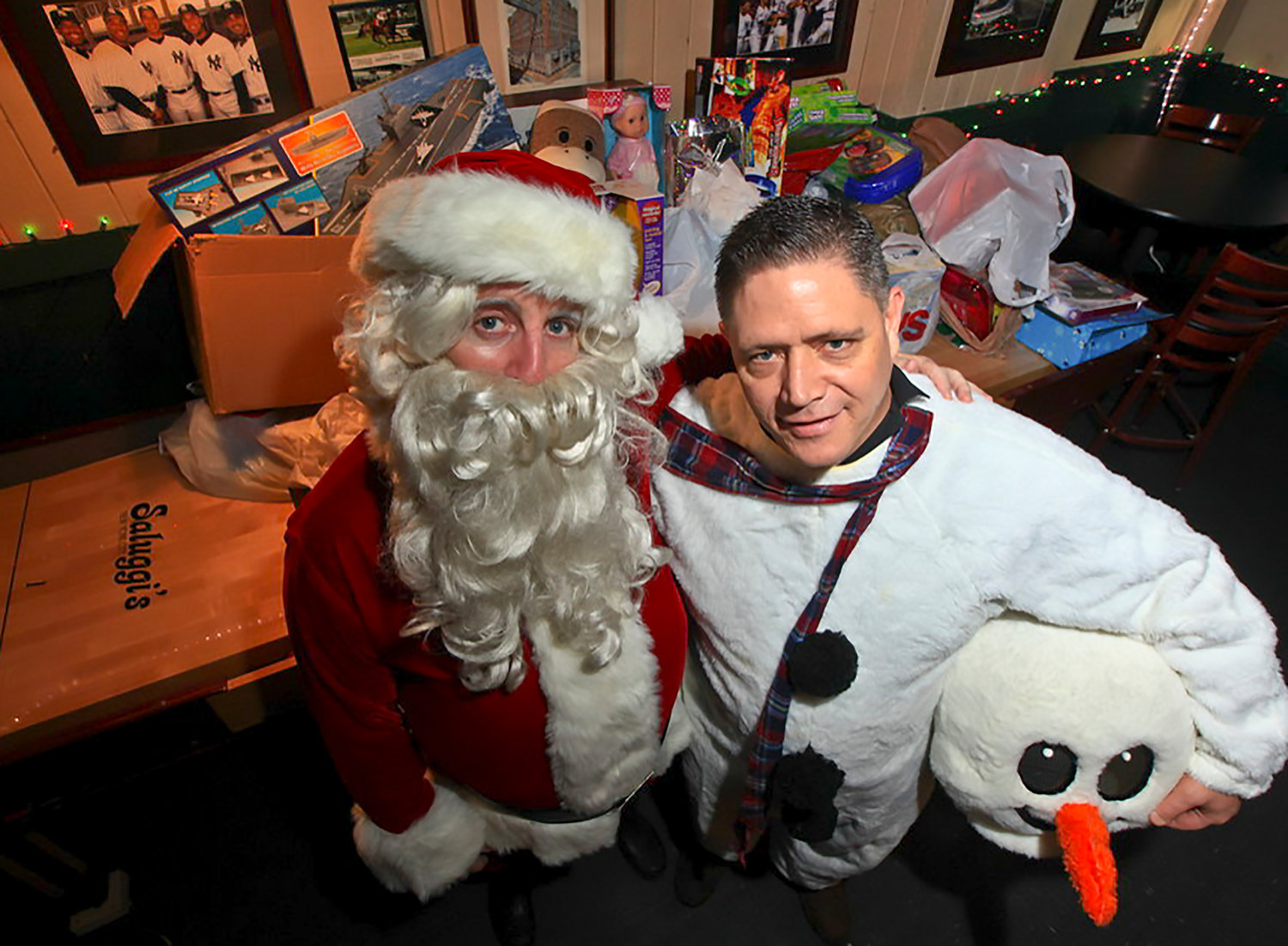 Every year for the past three decades, Terence Mulvey, left, and best friend Richard Walsh held a holiday toy drive for sick children who were patients at NewYork-Presbyterian Morgan Stanley Children's Hospital. Mulvey, who died earlier this month, dressed up as Santa Claus and go room-to-room handing out toys.
