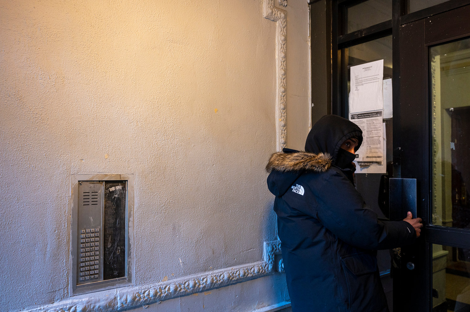 A man visiting 16 Marble Hill Ave., waits for someone to come open the door for him because the bells don’t work. Residents have also complained about other faulty services in the building as well, like heat, gas and plumbing. Some have even complained about collapsing ceilings — more than once.
