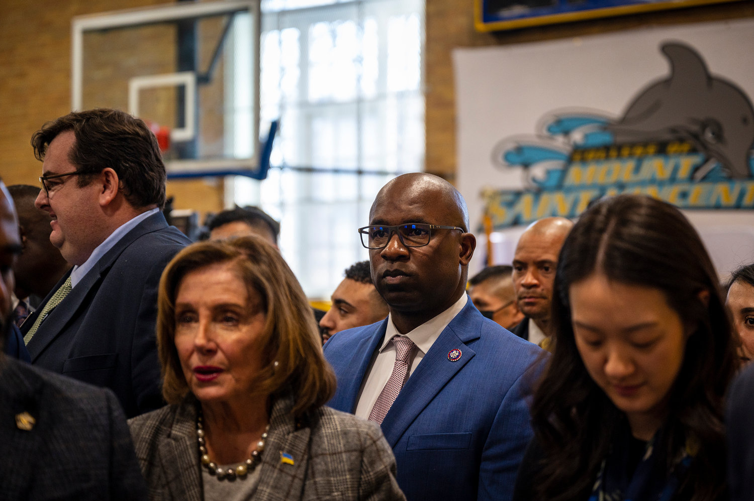 U.S. Rep. Jamaal Bowman takes a few minutes to talk with some of the invitees to his Monday town hall with House Speaker Nancy Pelosi at the College of Mount Saint Vincent.