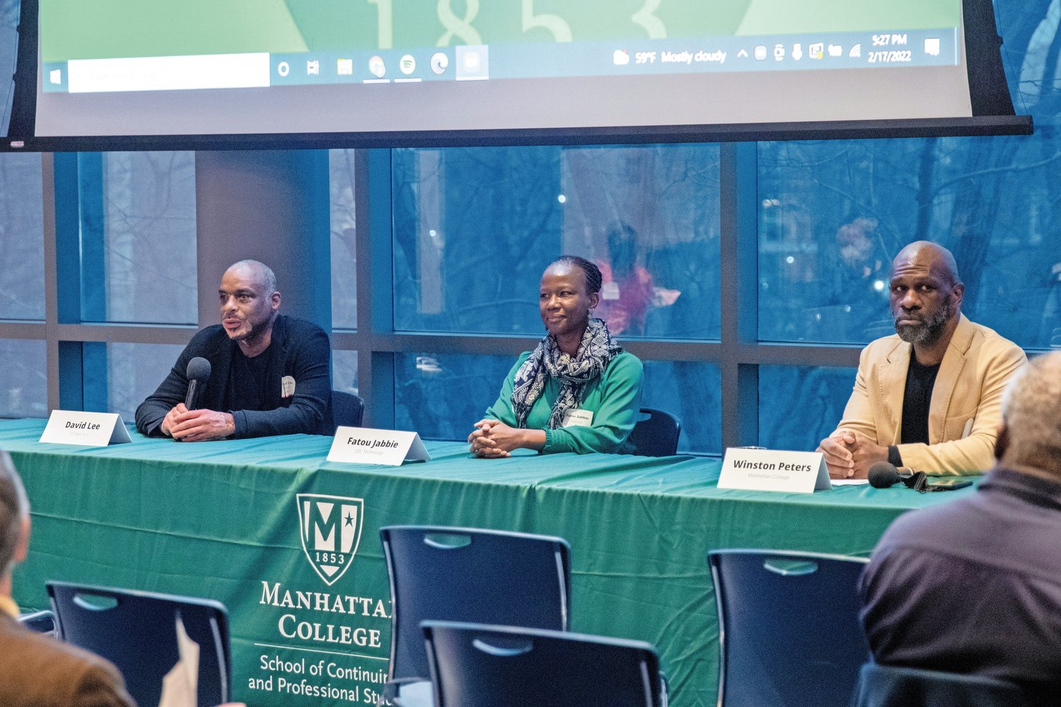 Business Entrepreneurs David Lee, left, Fatou Jabbie, middle, and Joel Mejia (not shown) joined a panel at the Kelly Commons building in Manhattan College recently to discuss their business in the Bronx and why they had an interest in the borough. Their similarities do not differ with moderator and Manhattan College professor Winston Peters, right.