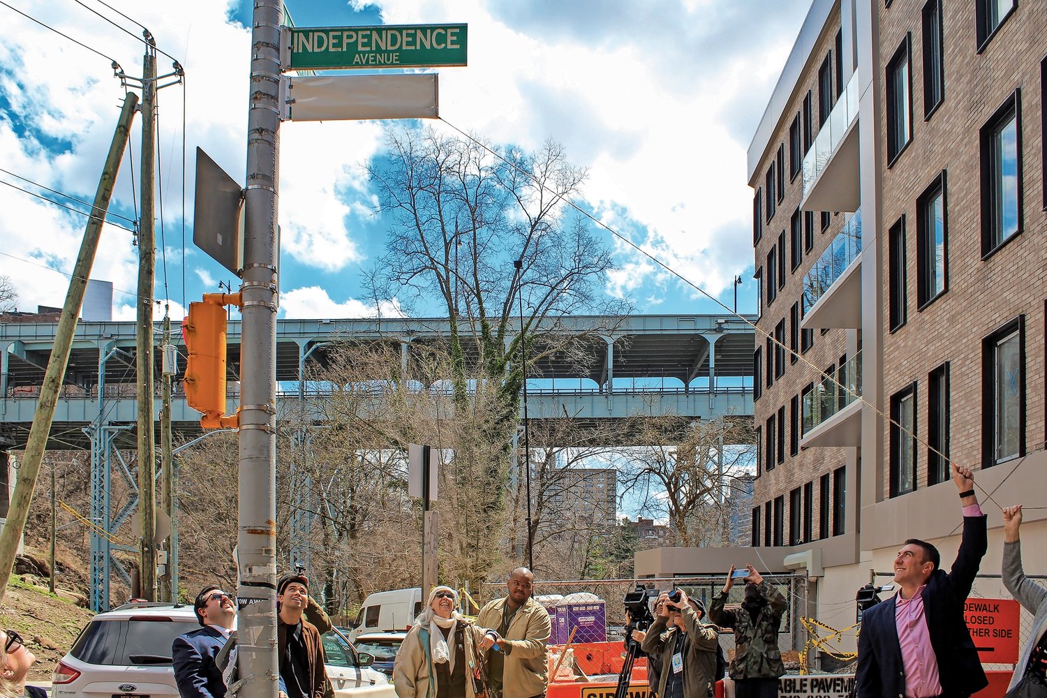 City councilman Eric Dinowitz and a host of guest speakers unveiled the historic co-street in Spuyten Duyvil April 8 to honor the late John J. McKelvey Sr. and his former building Villa Rosa Bonheur. It is at the intersection of Palisade and Independence avenues.