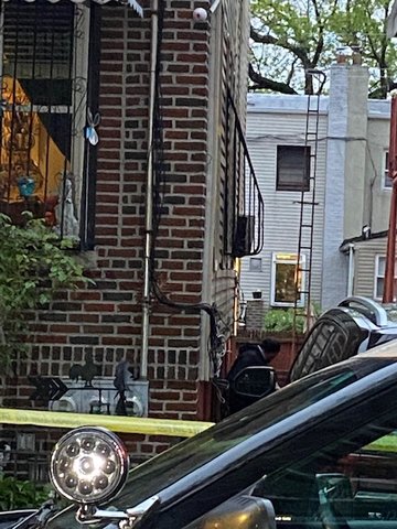 Police carrying shields and using a K-9 try to make their way into the basement of a Kingsbridge home where a man was shot and later died in the hospital.