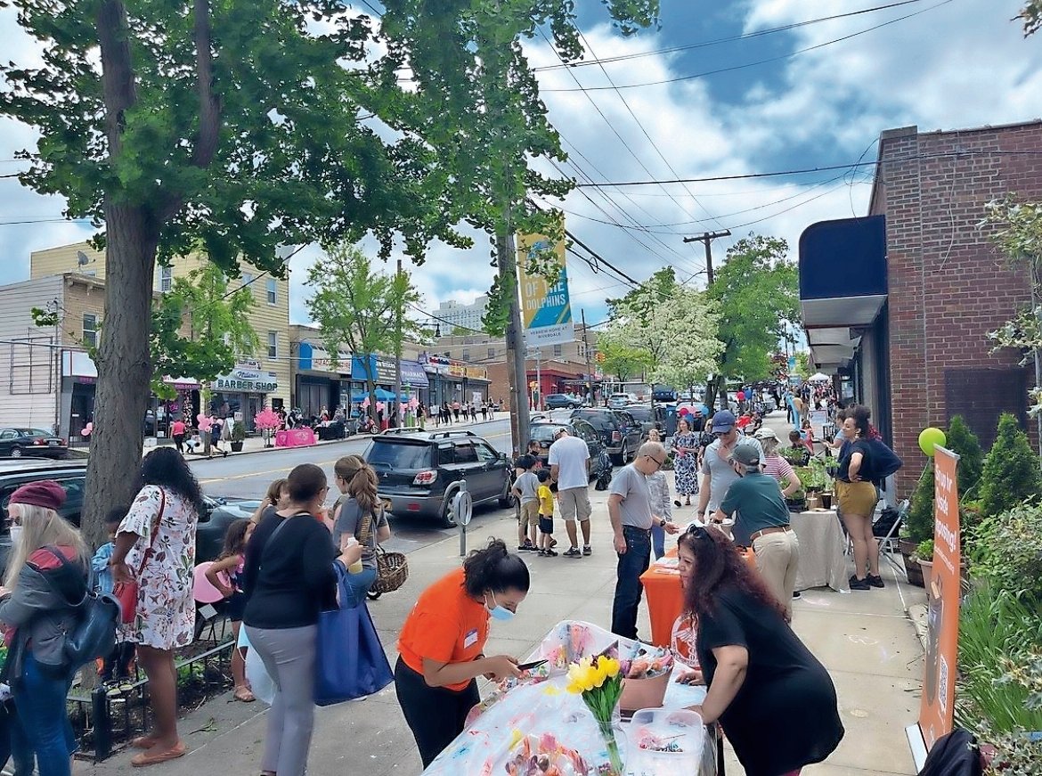People shop along Riverdale Avenue during the May 15 North Riverdale Block Party. The Riverdale Main Streets Alliance spearheaded the event as a way of honoring and supporting the businesses, restaurants and stores that have remained open after the coronavirus pandemic.