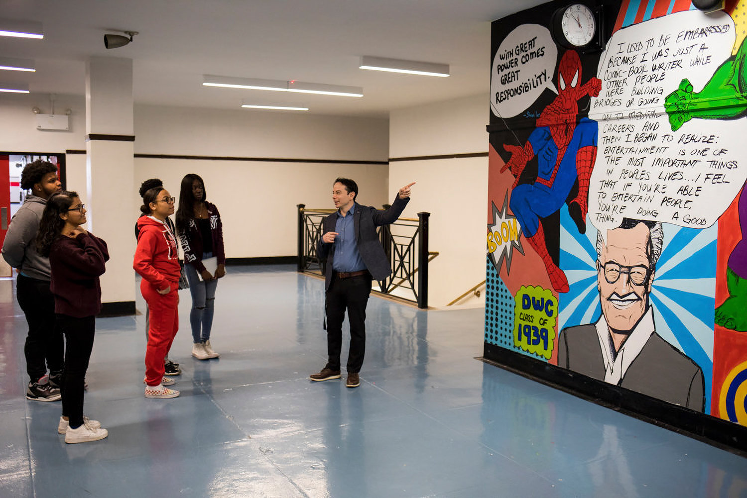 Pierre Orbe, the principal of DeWitt Clinton High School, talks with students about Stan Lee’s influence on him and late comic book legend’s legacy at the school last year. The city’s education department pumped the brakes on a plan to locate a fourth school within the Clinton campus.