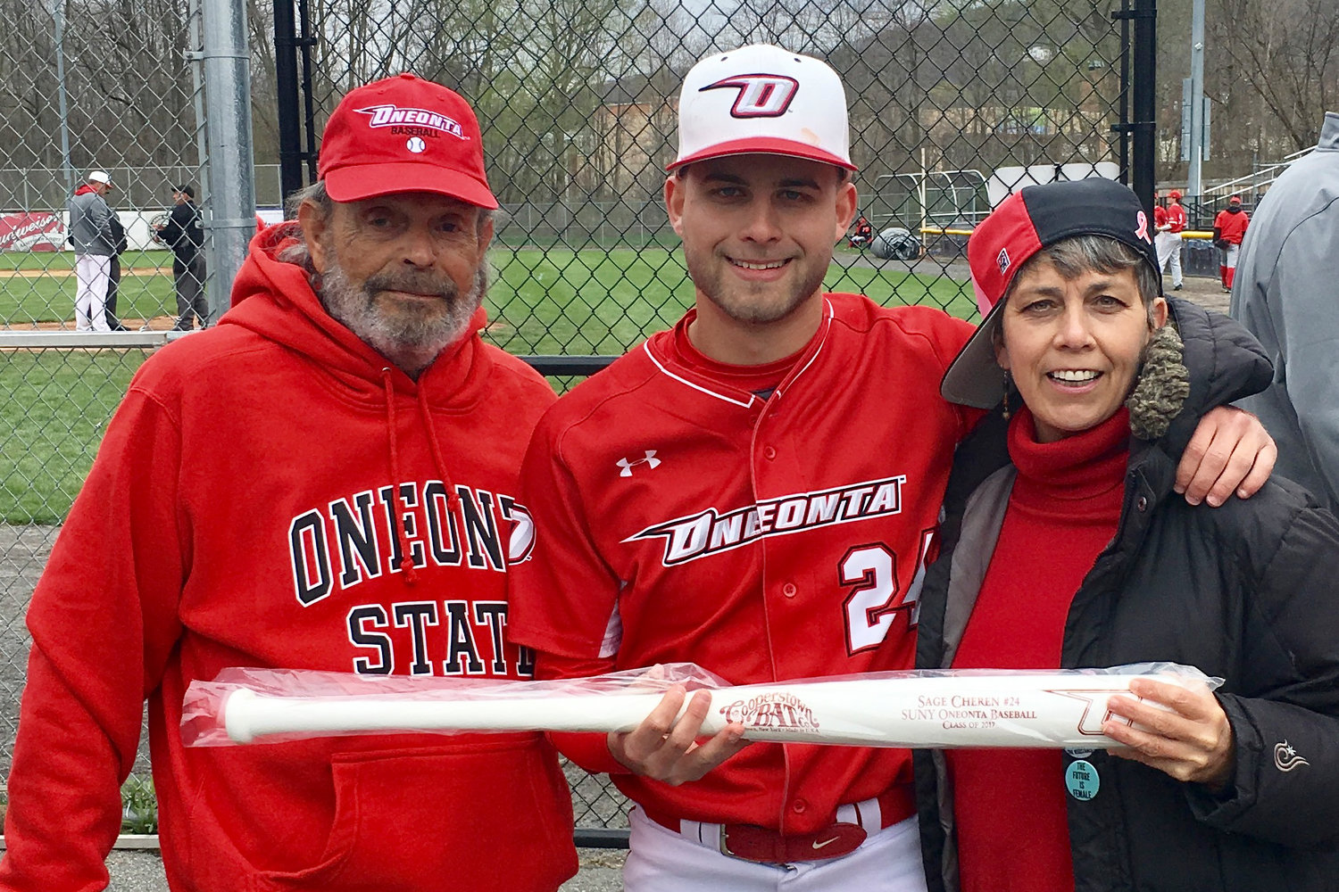 Ivan Cheren (left) and Deb Derella Cheren (right) pictured with their son Sage (center) after his last college game for SUNY Oneonta in 2017. Sage is now 27 years old and works in the real estate industry. But before that, he made countless memories watching and playing baseball with his father Ivan.