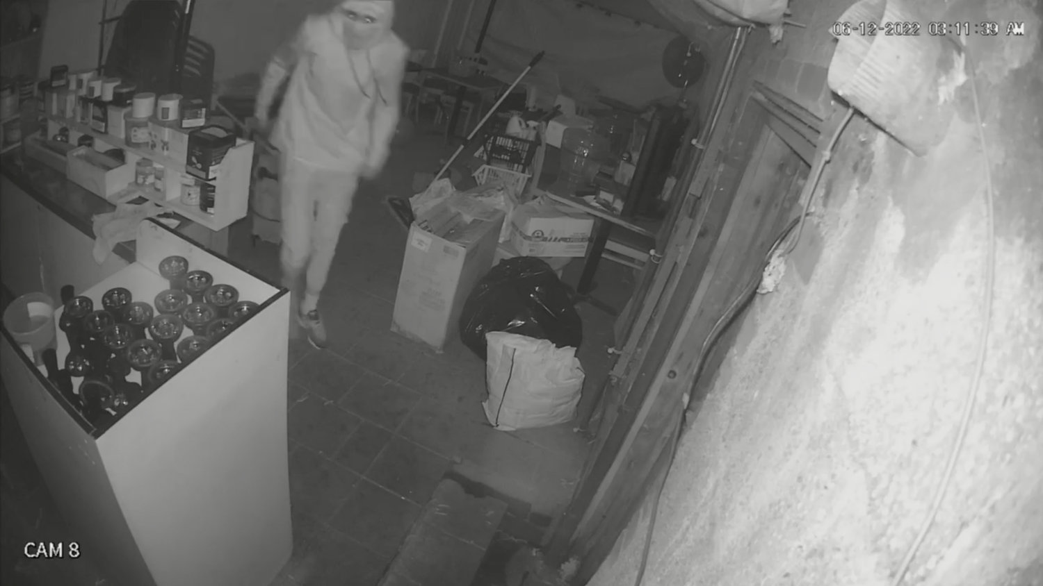 Security camera footage of the assailant who broke in and burgled Jerusalem Cafe June 12.