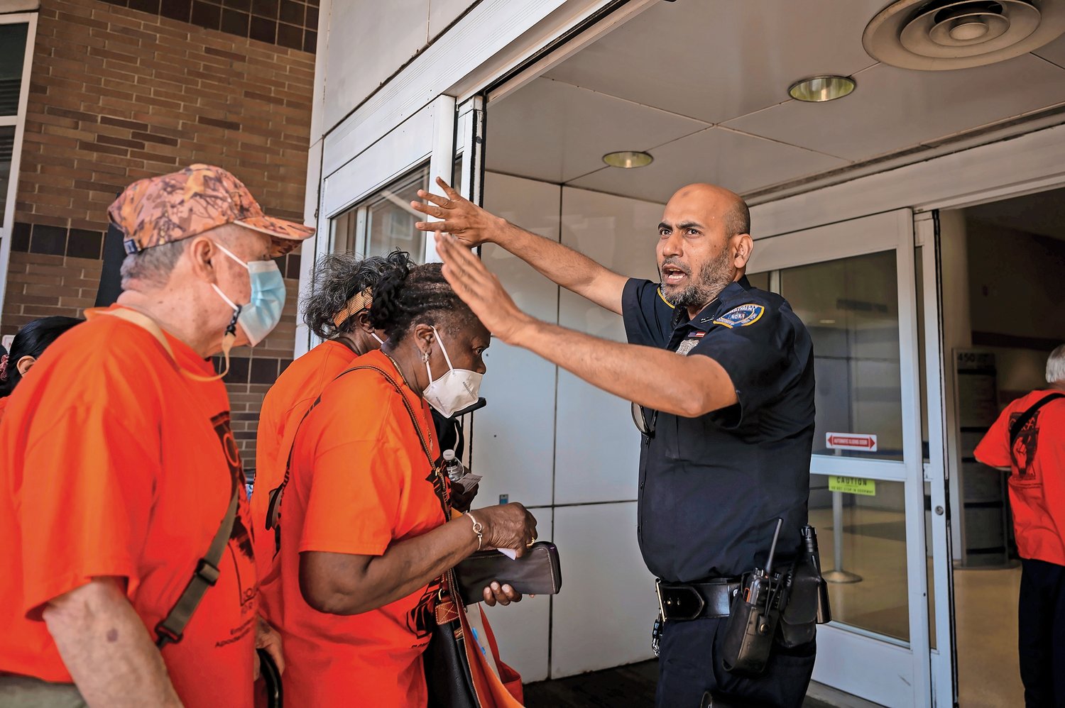 On arrival, rally members were urged to form a line to enter the Rent Guidelines Board hearing in small groups by Hostos Community College public safety officers.
