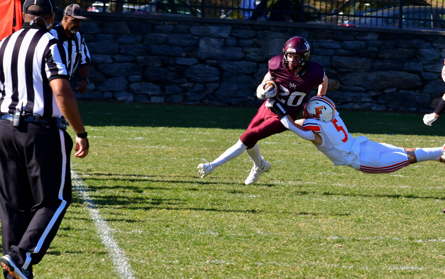 A Horace Mann running back tries to evade a Fieldston player during the Lions' blowout win over the Eagles.