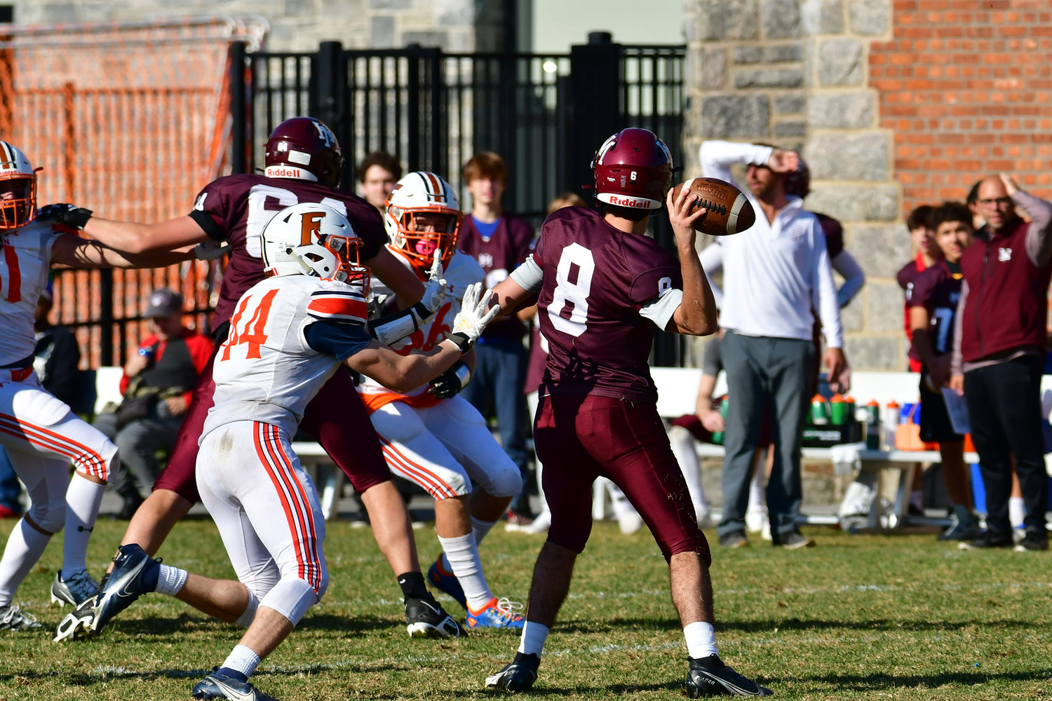 The Horace Mann School quarterback prepares to fire a pass downfield against Fieldston Saturday during the Lions’ 41-15 win.
