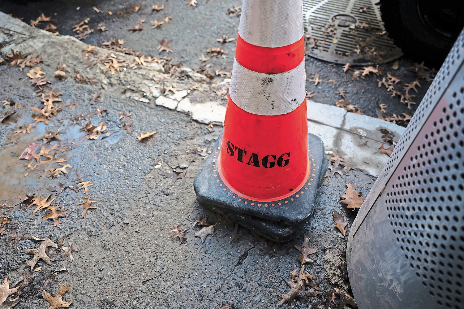 Stagg branded traffic cones at 3745 Riverdale Avenue, where a couple of lawsuits were filed for a dangerous sidewalk there.