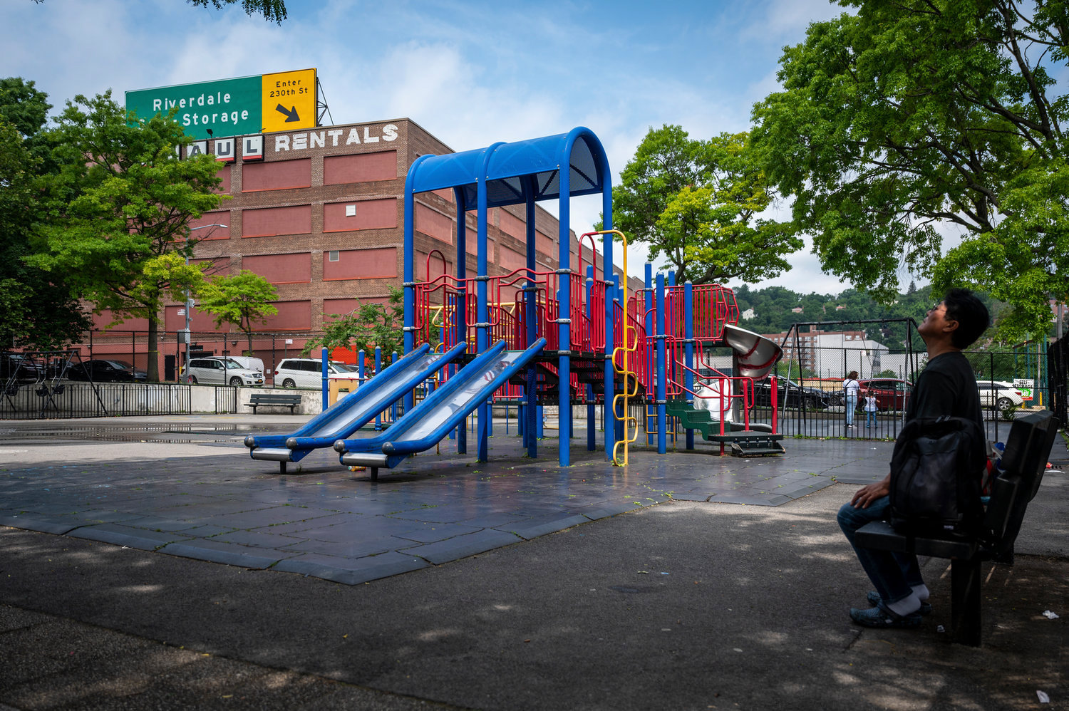 Life around Marble Hill Playground in 2021. The playground was the scene of a recent stabbing during a pickup basketball game.