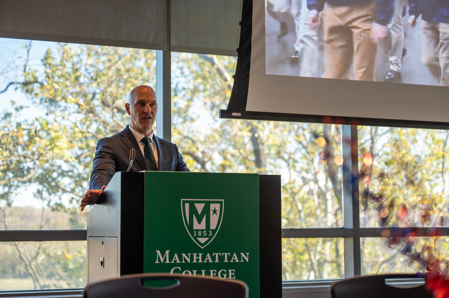 American Corporate Partners Senior Vice President Richard Comitz addresses veterans at a special luncheon at Manhattan College. Comitz was a lieutenant colonel in the U.S. Army for 20 years.