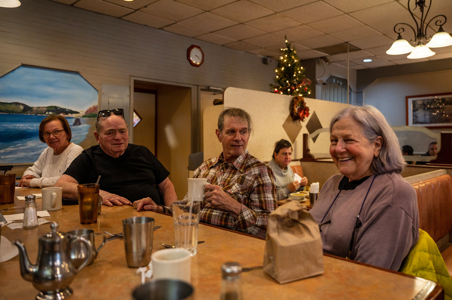 Shelly Bender enjoys a last meal with her friends at Blue Bay Restaurant on Johnson Avenue Nov. 28.