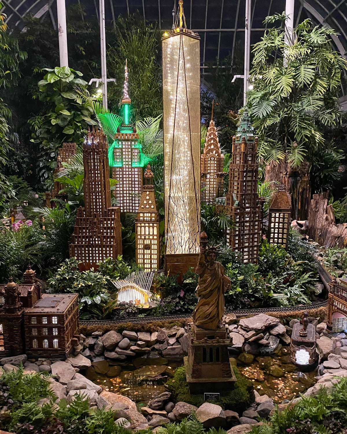 The Manhattan skyline, including the new Fulton Street station and the Freedom Tower, acts a backdrop for the Statue of Liberty at the annual New York Botanical Garden holiday train show over the holidays. This year’s show highlights wooden renditions of the city’s numerous bridges and many famous structures and homes. There was also a model of the Van Cortlandt House. The show continues through Jan. 22.