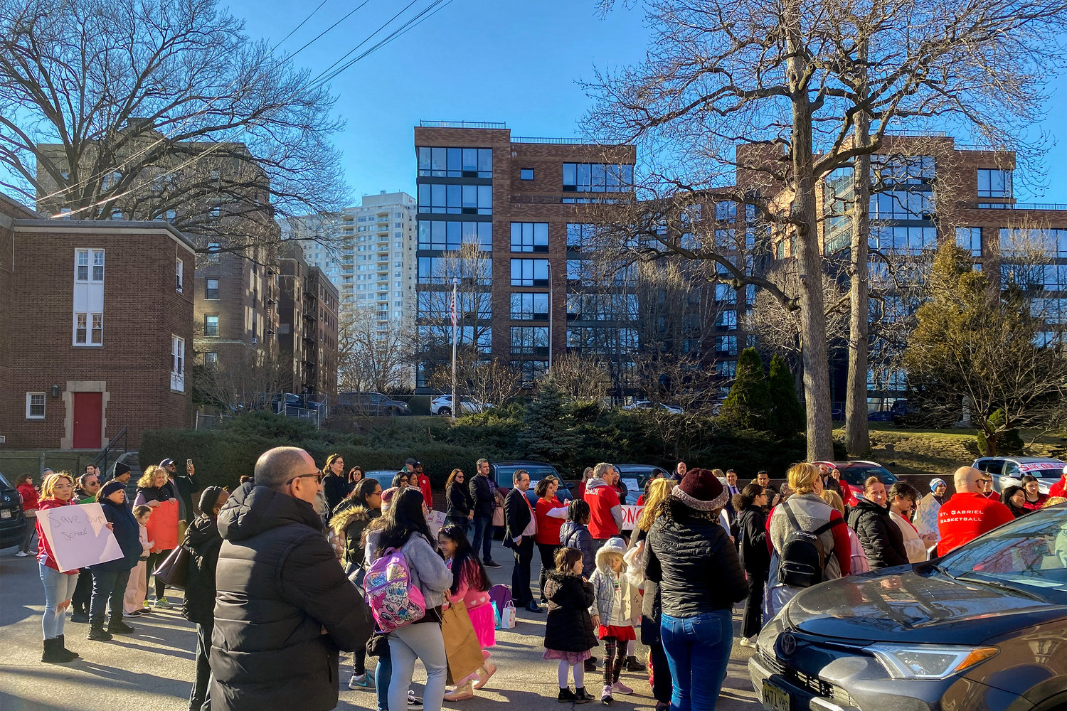 Students, parents and alumni rallied last week in front of Saint Gabriel School after a rumor leaked out to parents in early February. Even though the school will not close, a petition is being signed with almost 1,500 signatures and will be shown to the archdiocese.