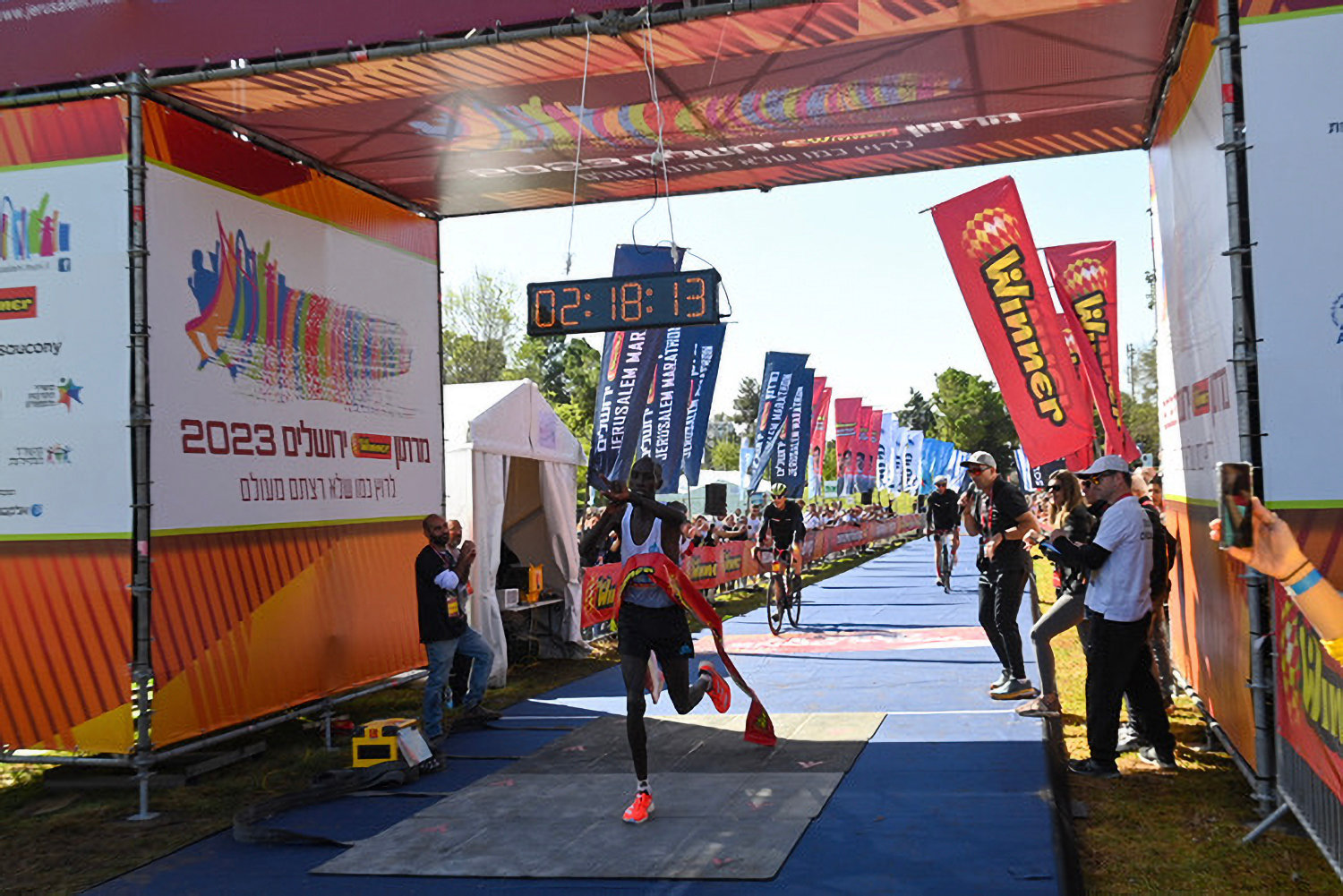 The winner of the International Jerusalem Winner Marathon on March 17 Noah Kigen Kiprotich crosses the finish line.