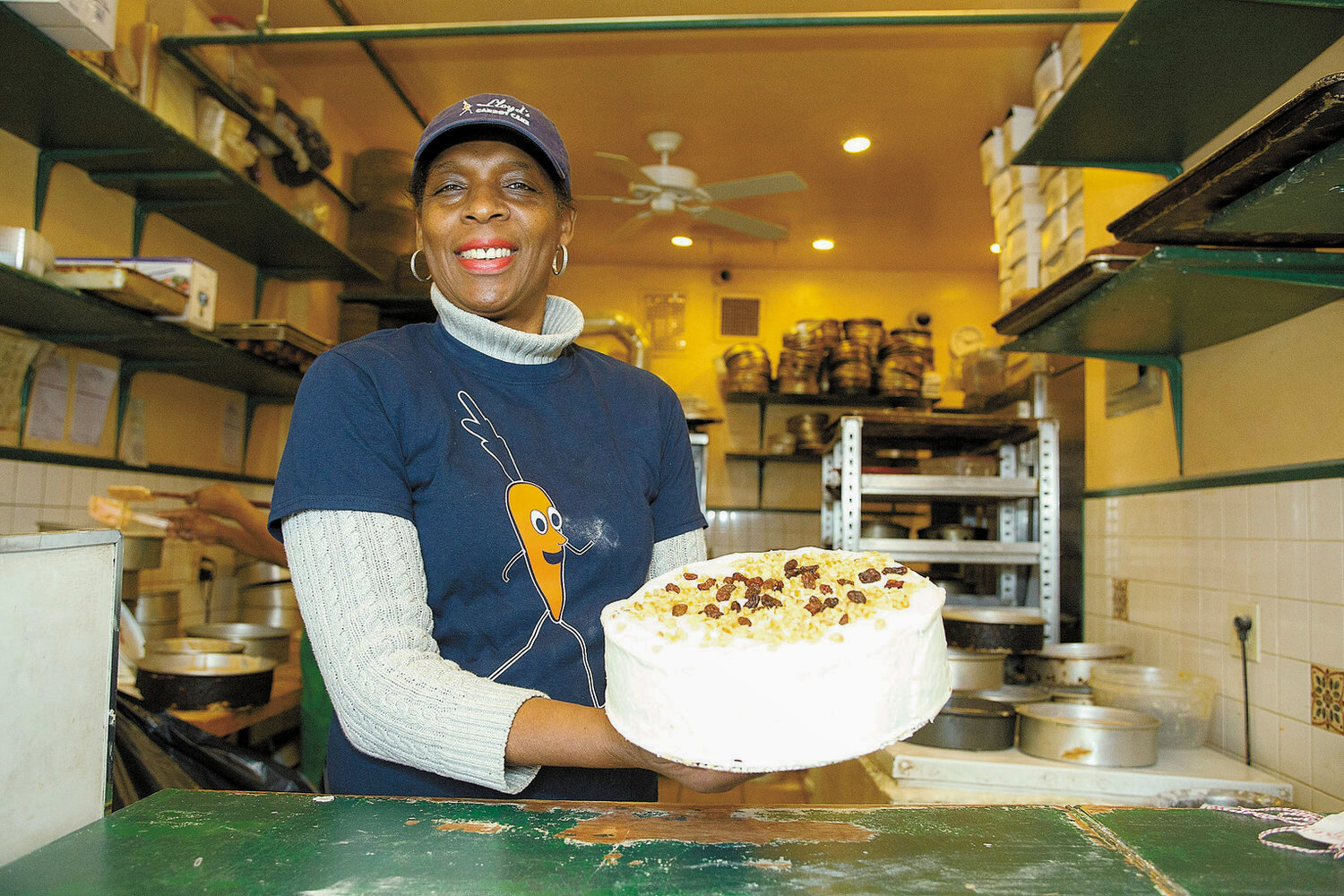 With the help of Lloyd’s Caribbean family recipe, Llyod and Betty Campbell-Adams opened a carrot cake bakery. After Lloyd’s death in 2007, Betty quit her job to work full time at Lloyd’s. Since then she has expanded the business with nationwide and international  shipping available.