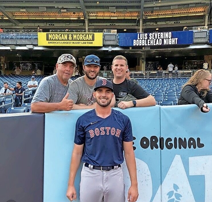 Courtesy of Nick Tucker 
After getting called up by the Boston Red Sox on Friday, Joe Jacques stands with his high school coaches before the Boston Red Sox played the New York Yankees at Yankee Stadium. Jacques was a three-sport athlete at Red Bank Regional High School in Little Silver, New Jersey, before playing college baseball at Manhattan College.