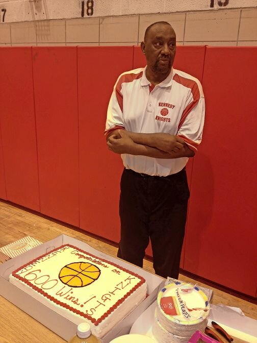 In 2013, Johnny Mathis clinched his 600th career victory as head boys basketball coach at John F. Kennedy High School. He finished with 719 wins which ranks him third in the history of the Public Schools Athletic League (PSAL).