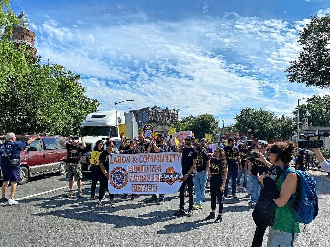 Members of the Northwest Bronx Clergy Coalition and unions rally on West Kingsbridge Road Sunday to let the public know their intent to keep the EDC honest about keeping its word regarding the Kingsbridge Armory redevelopment this time around.