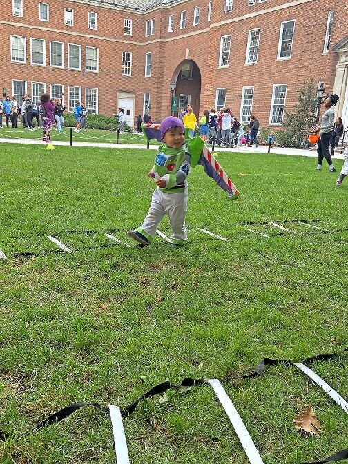 A local student take part in an activity during last year’s Safe Halloween event at Manhattan College. Members of the college’s Kappa Delta Pi hosted the students and will do so this year.