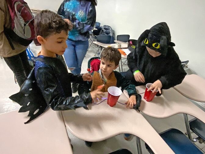Costumed students engage in art activities during last year’s Safe Halloween event at Manhattan College. This year the event has been renamed MC Halloween.