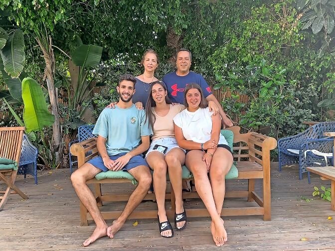 Nitzan Amar, middle, hangs out with her family who lives in northern Israel. Amar transferred to play for Manhattan College after playing on the University of North Carolina at Greensboro women's basketball team.