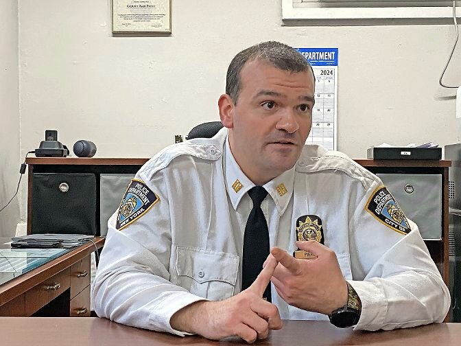 Capt. Ryan Pierce, the new commanding officer of the 50th Precinct, sits at his office at the 50th Precinct. The 18-year veteran worked at multiple commands across the city and Bronx. He had been acting CO since August before officially taking over last December.