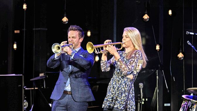 Benny Benack III and Bria Skonberg, armed with their trumpets, will perform Sunday, Feb. 25 as part of ‘Jazz at The Lincoln Center: Sing and Swing’ at the Lehman Center for Performing Arts .