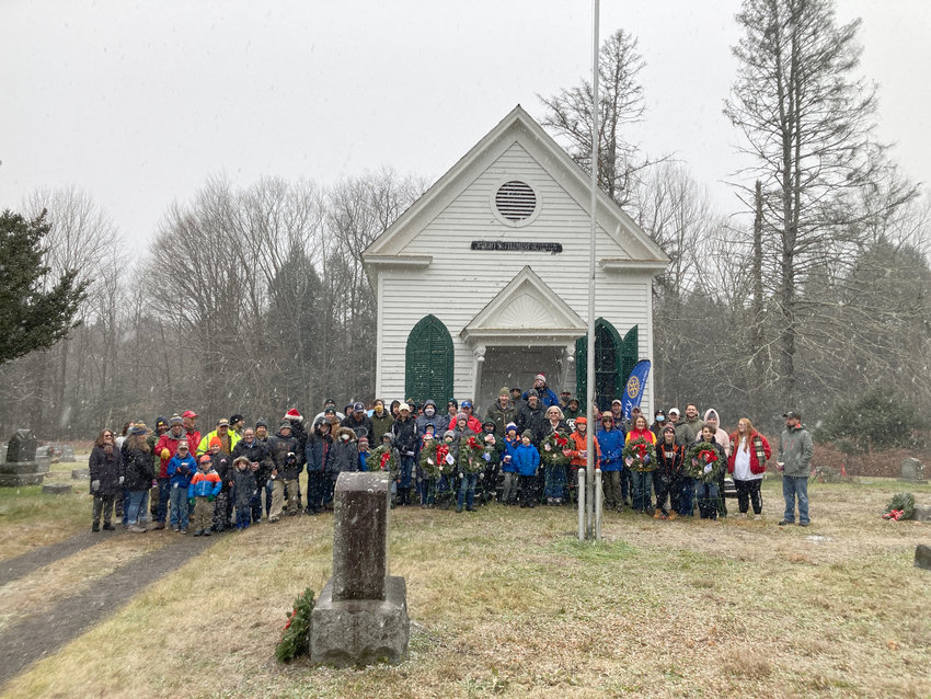 VOLUNTEERING &mdash; Over 70 volunteers participated in the Wreaths Across America and placed the wreaths. Dippin Donuts of Black River Boulevard assisted with refreshments for the volunteers.