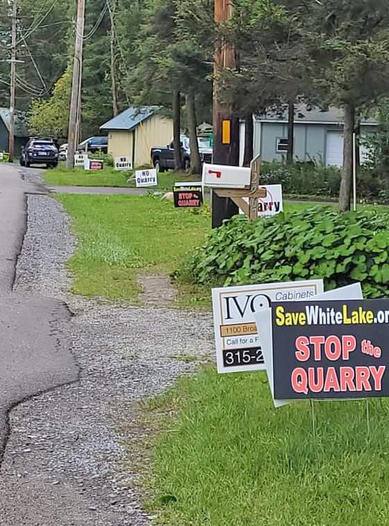 MAKING THEIR OPPOSITION KNOWN &mdash;&nbsp;Signs opposed to a proposed pink granite quarry near White Lake dot the lawns of residents in the Forestport community with several residents speaking against the project in this file photo from the summer of 2021.