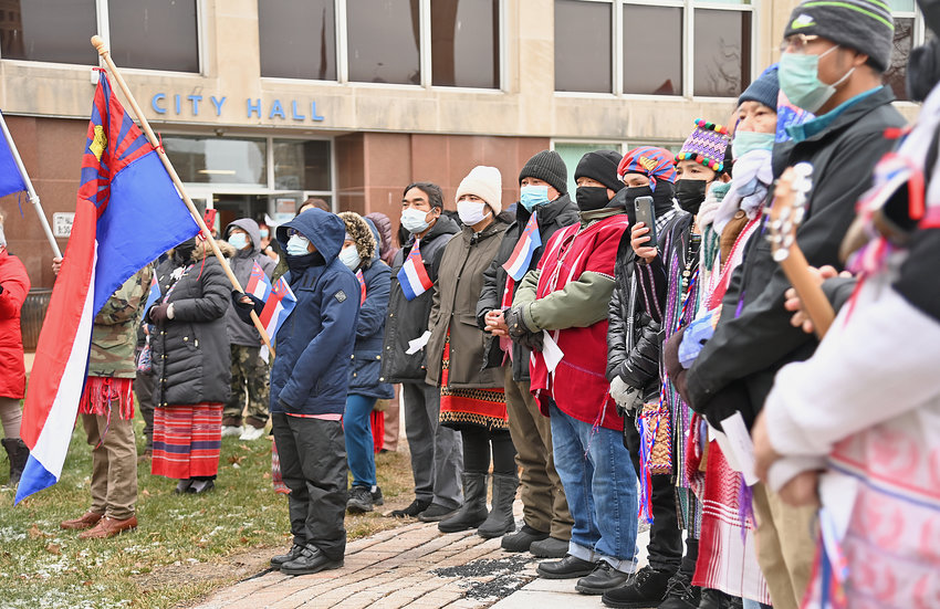 MARKING THE OCCASION &mdash; Members of Utica&rsquo;s Karen community along with fellow residents and supporters attend a flag raising ceremony on Wednesday, Jan. 5, 2022.