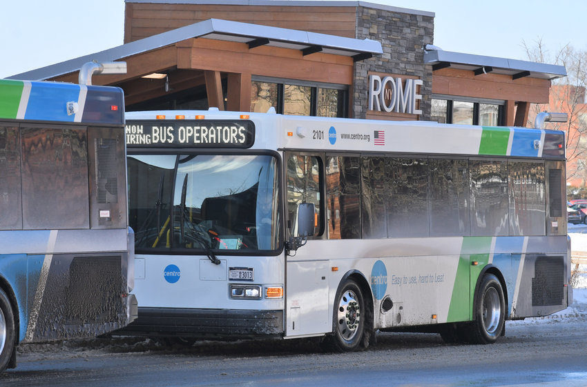 PICKING UP &mdash;&nbsp;A pair of Centro buses idle in front of the West Liberty Street hub amid frigid temperatures on Tuesday morning. The popular transportation service, particularly during the winter season, is requesting an increase in some fares and has solicited public comments on its proposal.