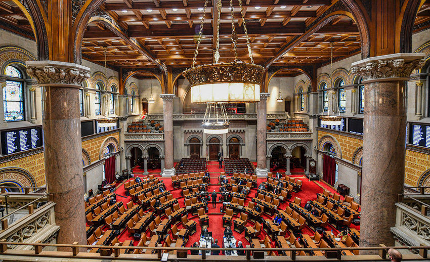 View of the New York state Assembly Chamber as members meet on the opening day of the 2021 legislative session at the state Capitol in Albany, N.Y. Wednesday, Jan. 6, 2021, in Albany, N.Y. A bipartisan commission tasked with redrawing New York's congressional districts has until Tuesday to agree on new boundaries &mdash; or risk having Democratic lawmakers seize control over a reapportionment process voters hoped would minimize gerrymandering.