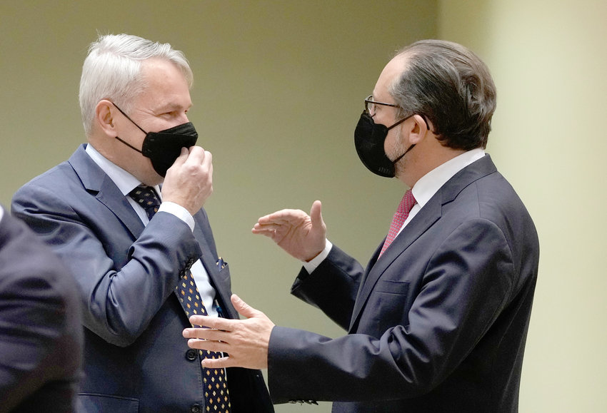 FOREIGN DISCUSSIONS &mdash; Austrian Foreign Minister Alexander Schallenberg, right, speaks with Finland&rsquo;s Foreign Minister Pekka Haavisto during a meeting of EU foreign ministers at the European Council building in Brussels, Monday.