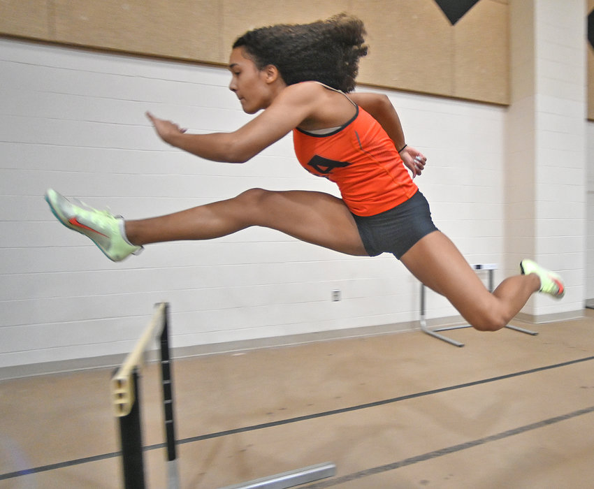 PRACTICE HURDLE &mdash; Rome Free Academy sophomore Imani Pugh practices the 55-meter hurdles at the RFA indoor track on Thursday afternoon. Pugh is competing in the 55 hurdles and the long jump today at the Ocean Breeze Athletic Complex on State Island