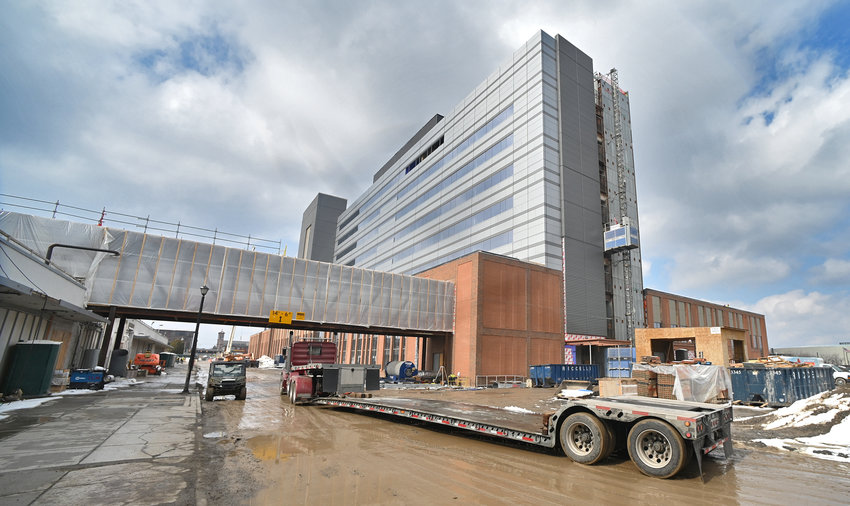 MOVING PARTS &mdash; A  truck goes under the Columbia Street pedestrian bridge of the Wynn Hospital in Utica on March 10, 2022.