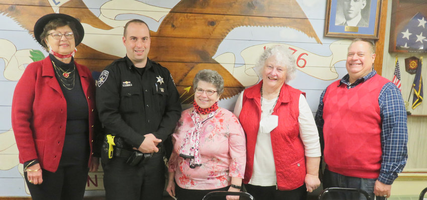 ORISKA VALLEY SENIORS &mdash; Officer Curtis Morgan, with the Community Affairs Unit at the Oneida County Sheriff&rsquo;s Office, spoke at a recent meeting of the Oriska Valley Seniors. Morgan informed members of the Oriska Valley Seniors about telephone and internet scams, alongside fraud and Yellow Dot program. Morgan gave examples of scams and what to do when faced with one and answered questions. Handouts were available on the Yellow Dot program, which is designed to help first responders provide life-saving medical attention during that first &ldquo;golden hour&rdquo; after a crash or other emergency. Morgan also provided information on Project Lifesaver and the ASCEND program. From left: Mabel Silliman; Morgan; Nancy Austin; Margot Klisiwecz; and Doug Lopesz.