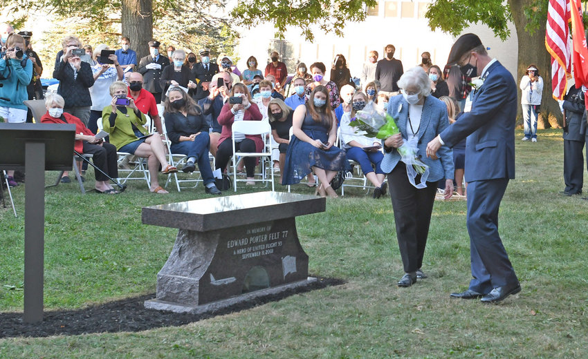 LASTING TRIBUTE &mdash;&nbsp;Gordon Felt, of Remsen, and Shirley Felt, of Clinton, brother and mother of Flight 93 victim Edward Porter Felt, a member of the Clinton Central School Class of 1977, look over a memorial in Edward&rsquo;s honor during a ceremony in Clinton on Sept. 11, 2020. The Clinton Central School District, in partnership with the Flight 93 September 11th Memorial Committee, has announced the First Annual Flight 93 Edward Felt Community Run/Walk Challenge to raise funds that will go toward the annual scholarship given in honor of Edward Felt.