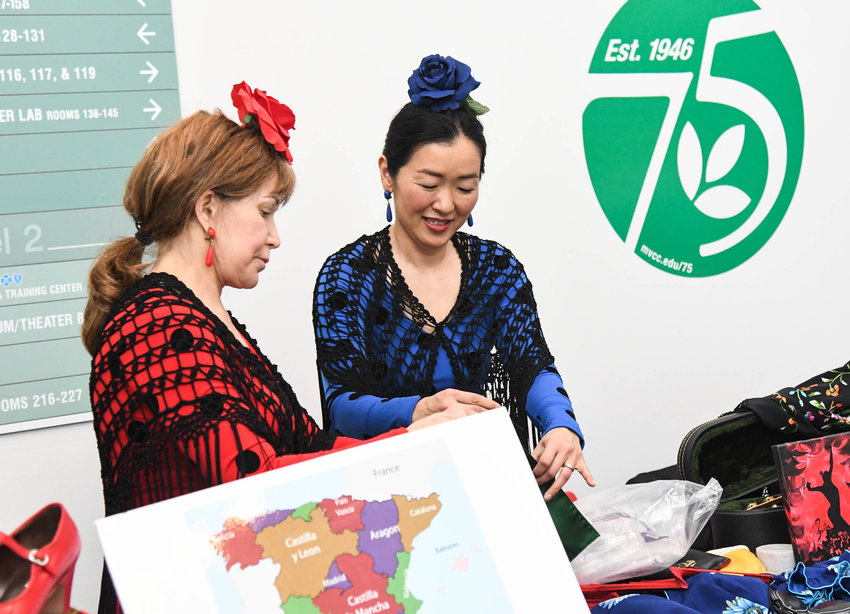 INTERNATIONAL FLAIR &mdash; Laurel Sonne, left, and Chie Wolicki take part in Mohawk Valley Community College&rsquo;s International Festival on Tuesday. Sonne teaches flamenco, a dance and art form based on the various folkloric music traditions of southern Spain, to Wolicki and said she is one of her best students.
