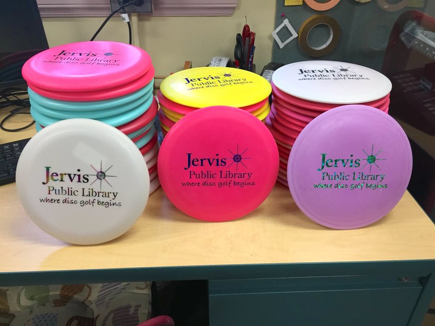 BORROW FUN &mdash; Jervis Public Library offers disc golf kits for use on the corse at the Griffiss International Sculpture Garden and Nature Trail.