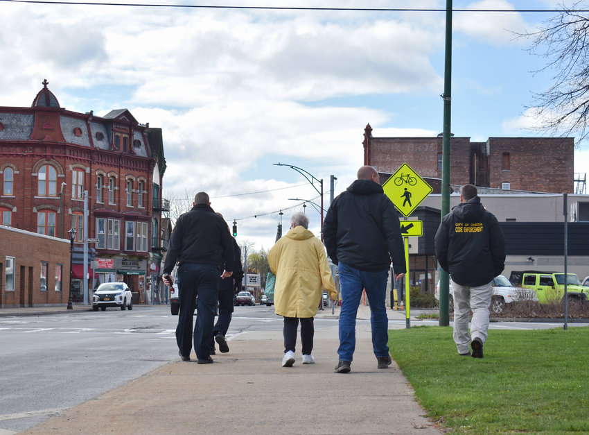 City officials take to the streets to say hello to businesses and residents as part of Operation: Walk Oneida.