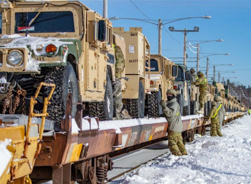 BIG IMPACT &mdash;&nbsp;Soldiers with the 10th Mountain Division at Fort Drum in Watertown secure vehicles on a flatbed train car in this file photo included in Fort Drum&rsquo;s 2021 economic impact report.  According to the report, Fort Drum had an economic impact of more than $1.5 billion on the North Country.