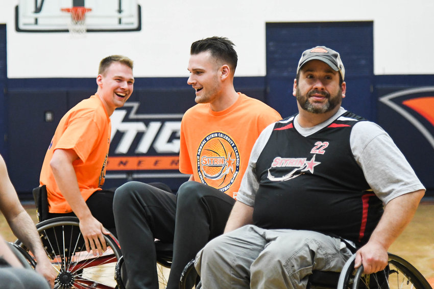 BOEHEIM BROTHERS &mdash; Syracuse Orange players Buddy and Jimmy Boeheim participate in the 18th annual Sitrin Celebrity Wheelchair Basketball Game on Thursday night at Utica University.