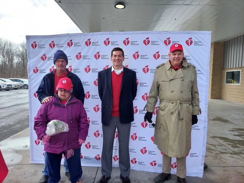 From left, Tera Davis, front, Ryan LeoGrande and John Nogas, the 2022 Red Cap Ambassadors, during the kickoff to the event on March 4. The Red Cap Ambassadors were joined by Tera&rsquo;s father, Mark Connolly, far left. Photo submitted