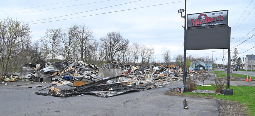 MAZZAFERRO'S IN RUINS &mdash;&nbsp;This pile of debris is all that remains of the longtime Rome landmark location Mazzaferro's Meats &amp; Deli on Ridge Mills Road. The iconic market was destroyed in a massive fire Friday afternoon.